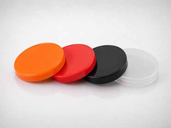 Plain plastic jar caps in 73mm, 83mm and 96mm sizes in orange, red, black and natural colors